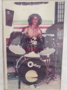 a young blair westbrook plays drums