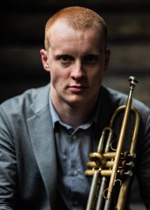 lachlan mckenzie holding a trumpet