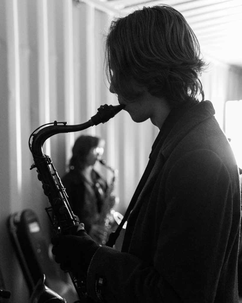 Chris James playing tenor saxophone